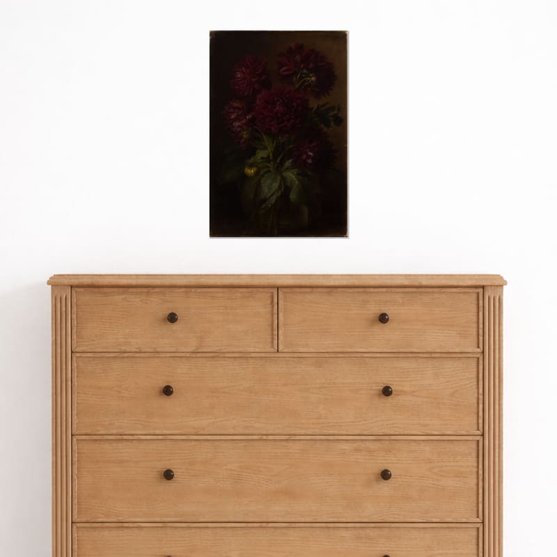 Dark Dahlias print hanging above a light oak dresser.