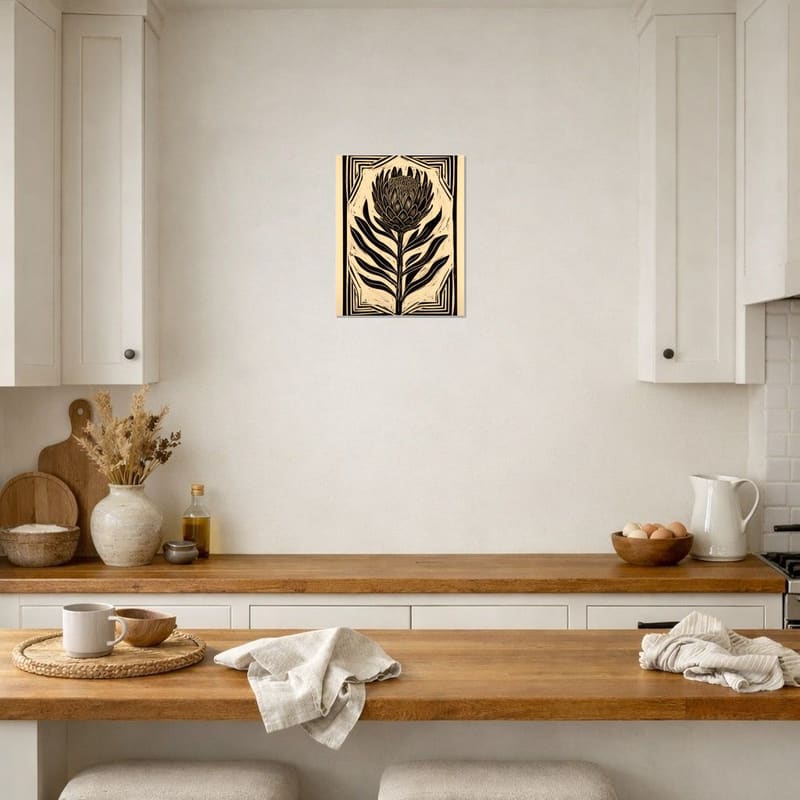Ink Protea print hanging as a framed piece on a kitchen wall.