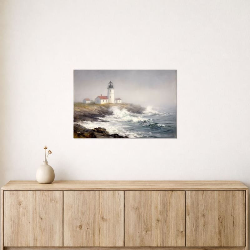 Maine Lighthouse print hanging above a light wood sideboard.
